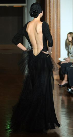 Illustration for article titled Christian Lacroix Couture Show A Blitz Of Somber Creativity For Dark Times
